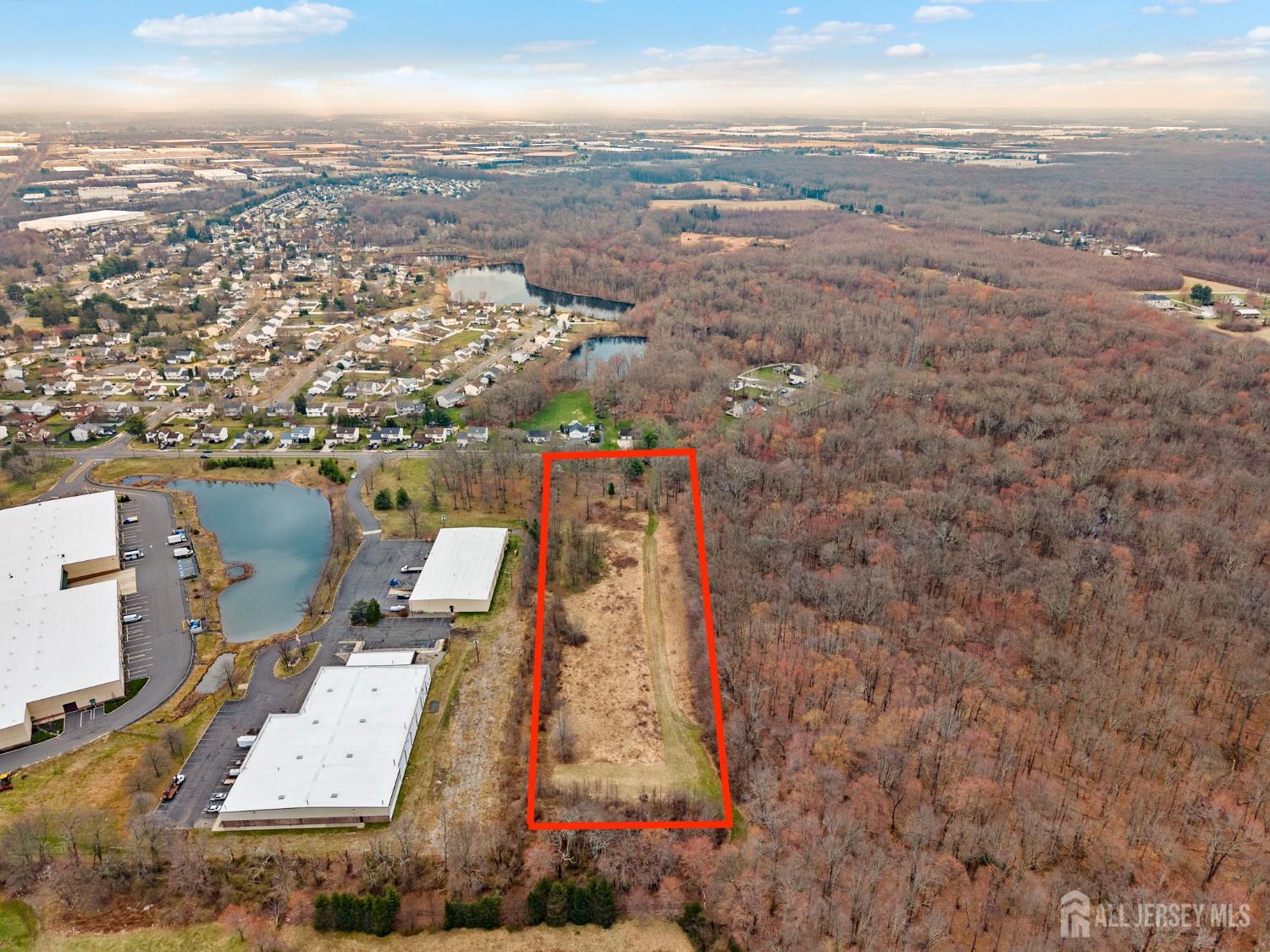36 Haypress Road Cranbury, NJ 08512 - Photo 5 of 11 an aerial view of a city with ocean view