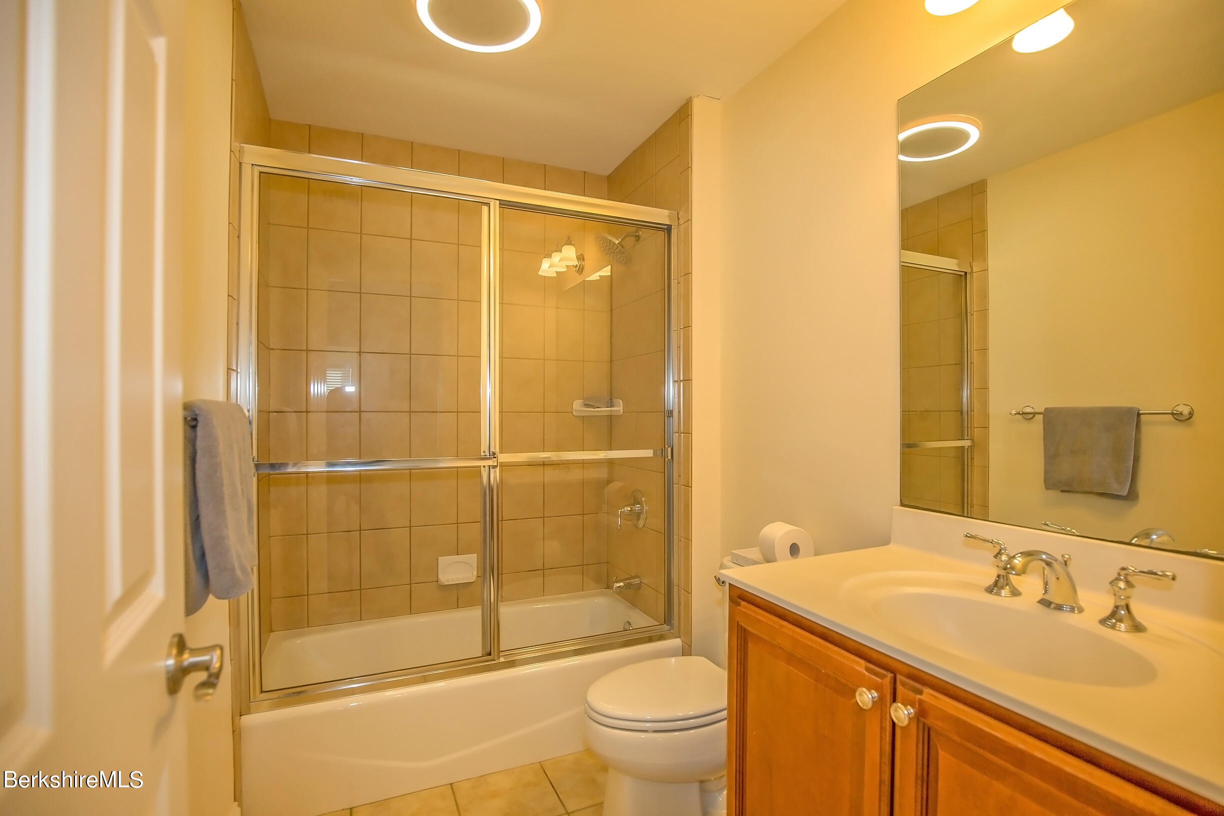 77 Alpine Trail Pittsfield, MA 01201 - Photo 25 of 58 a bathroom with a sink mirror toilet and shower