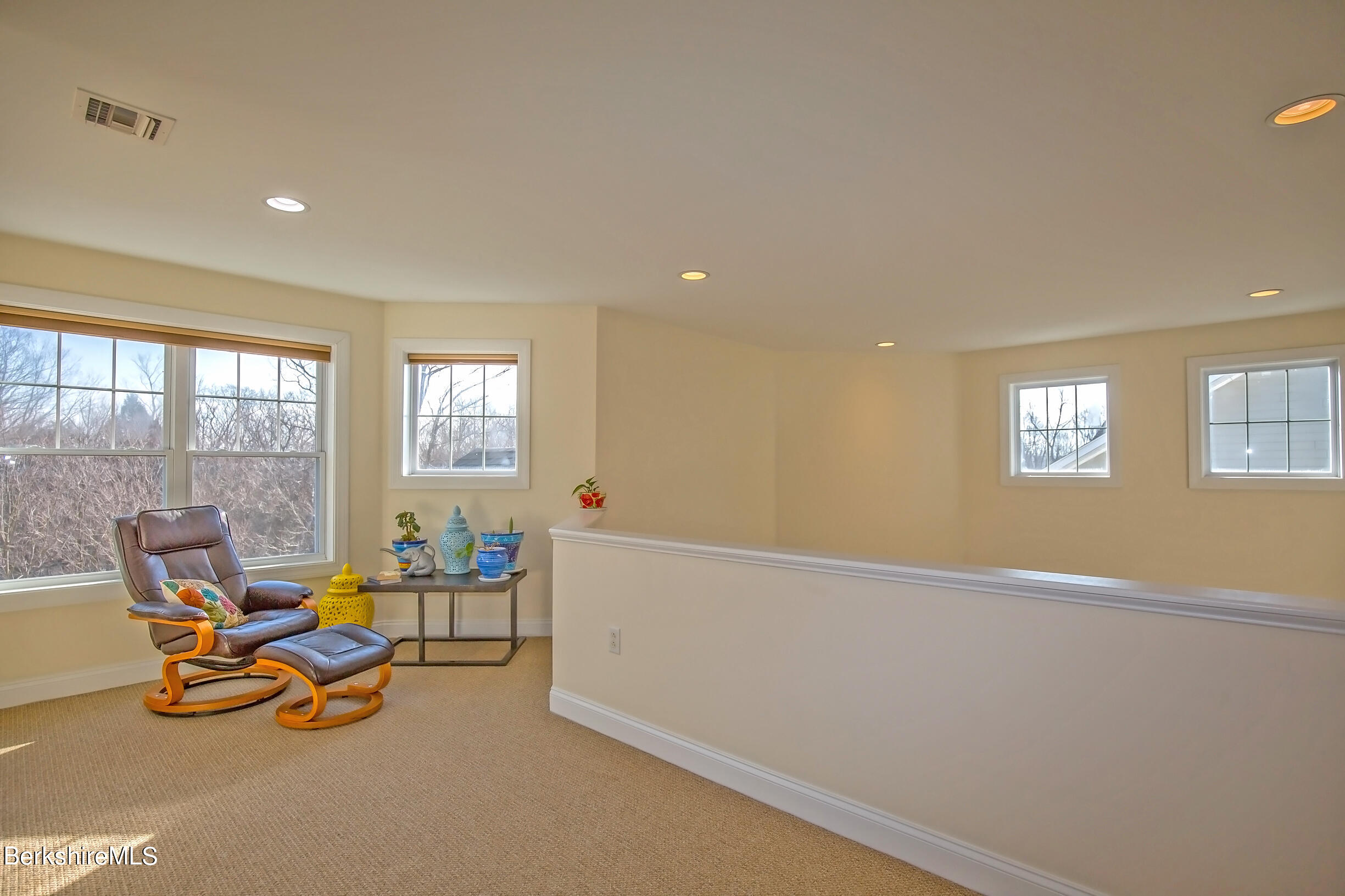 77 Alpine Trail Pittsfield, MA 01201 - Photo 27 of 58 a living room with furniture a rug and a large window