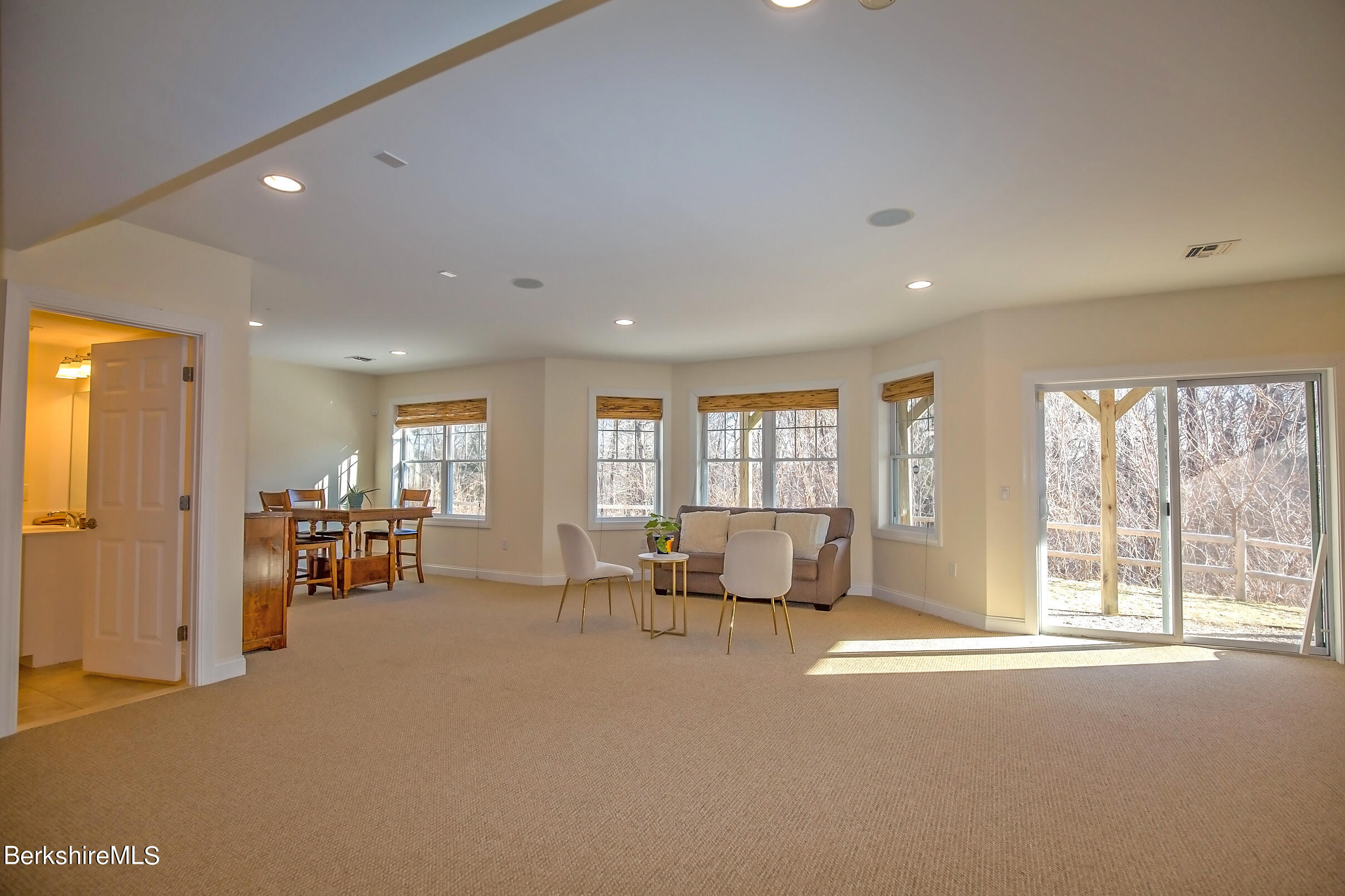 77 Alpine Trail Pittsfield, MA 01201 - Photo 43 of 58 a living room with furniture and large windows