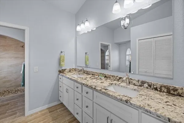 a bathroom with a shower and a toilet