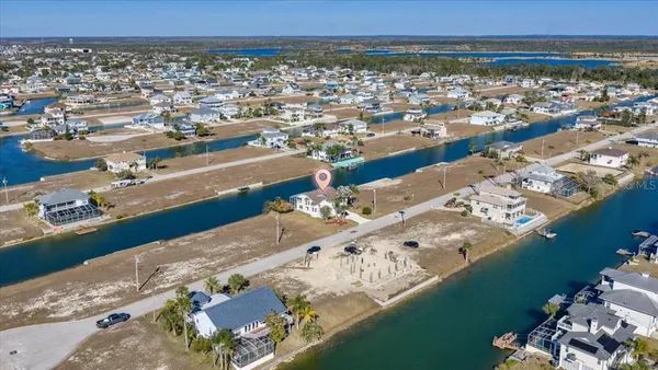 an aerial view of beach and ocean