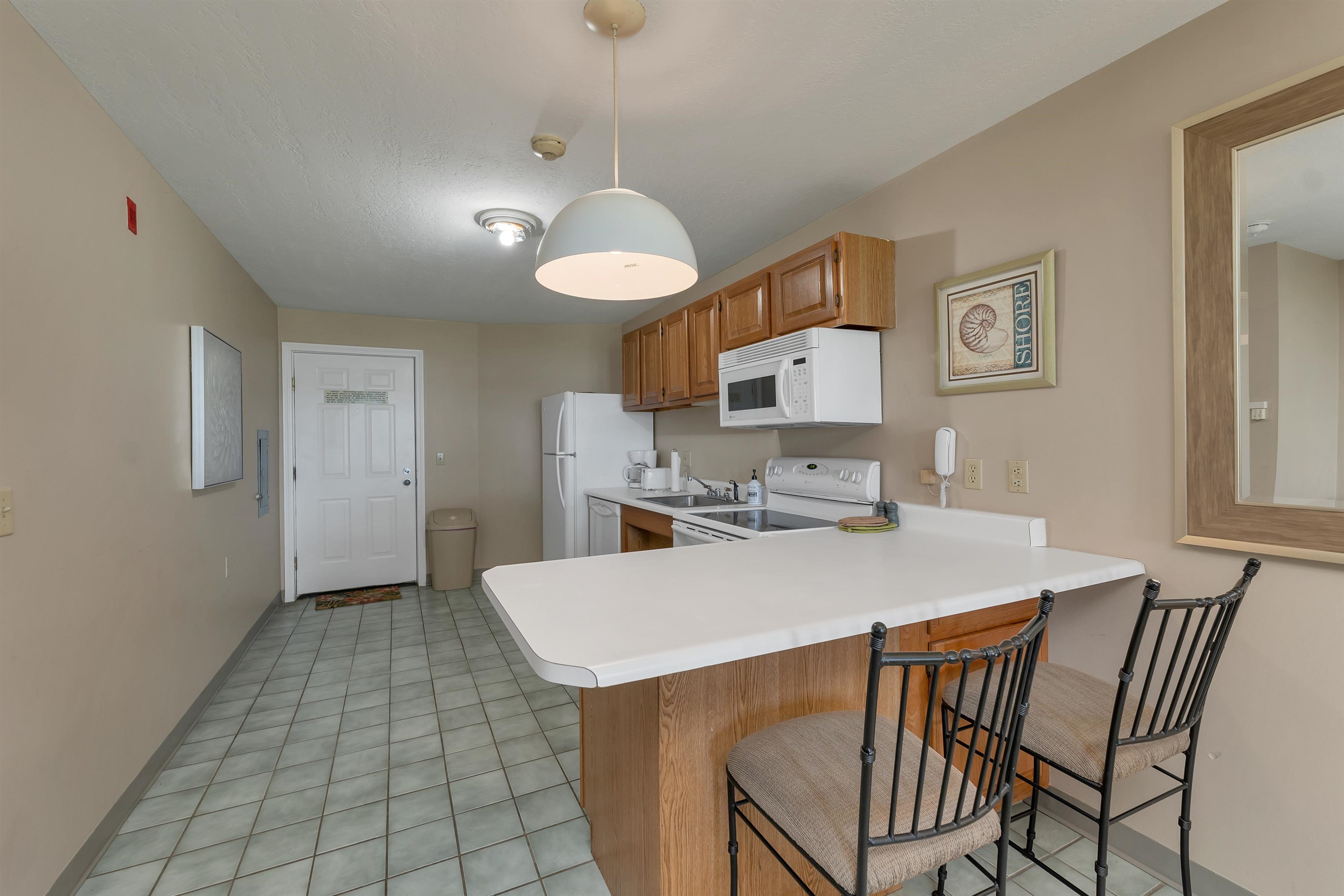 115 Weirs Road, Unit 109B Gilford, NH 03249 - Photo 11 of 38