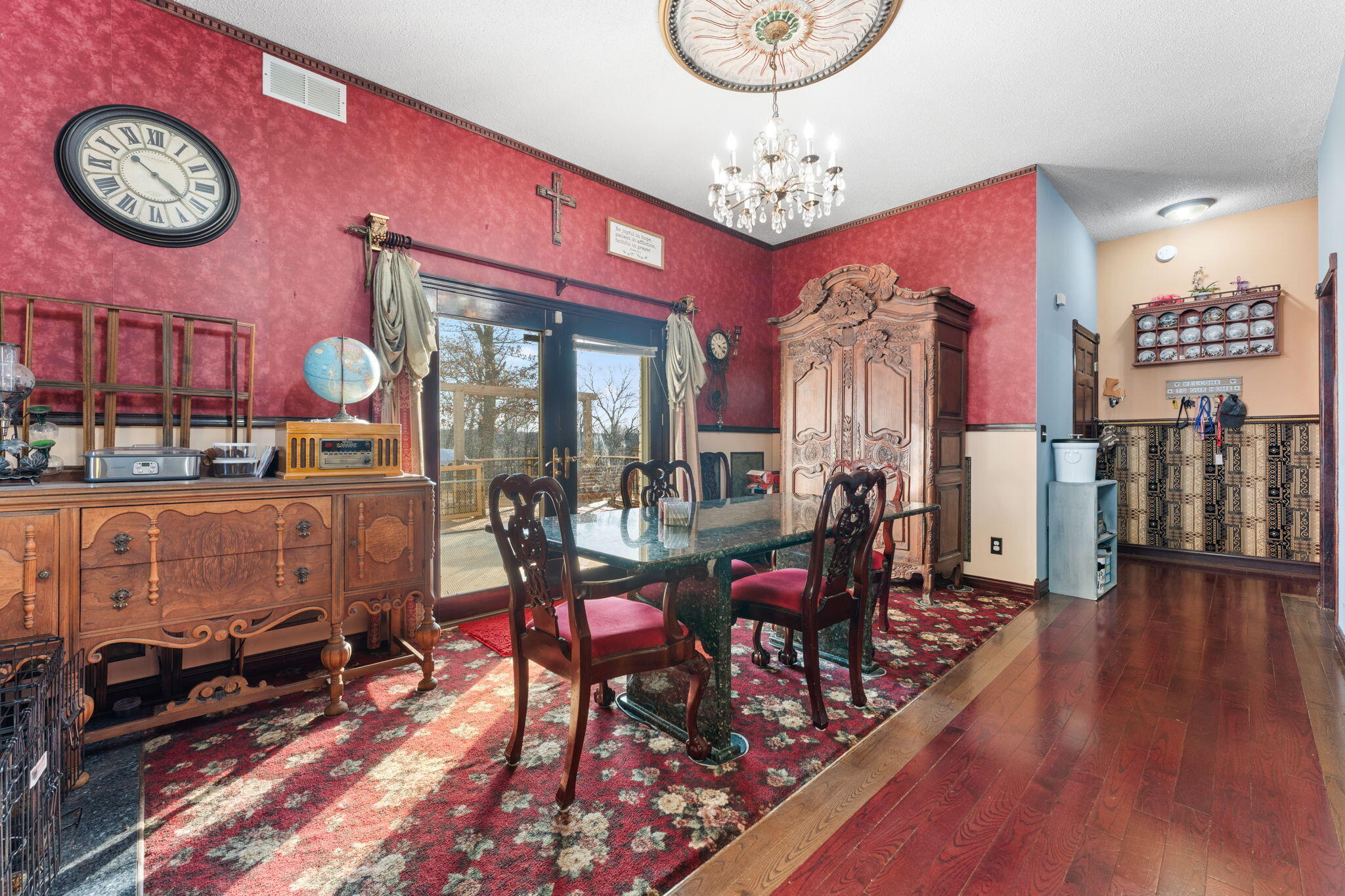 3115 West 800th Street North Rensselaer, IN 47978 - Photo 19 of 36 a view of a dining room with furniture wooden floor and a chandelier