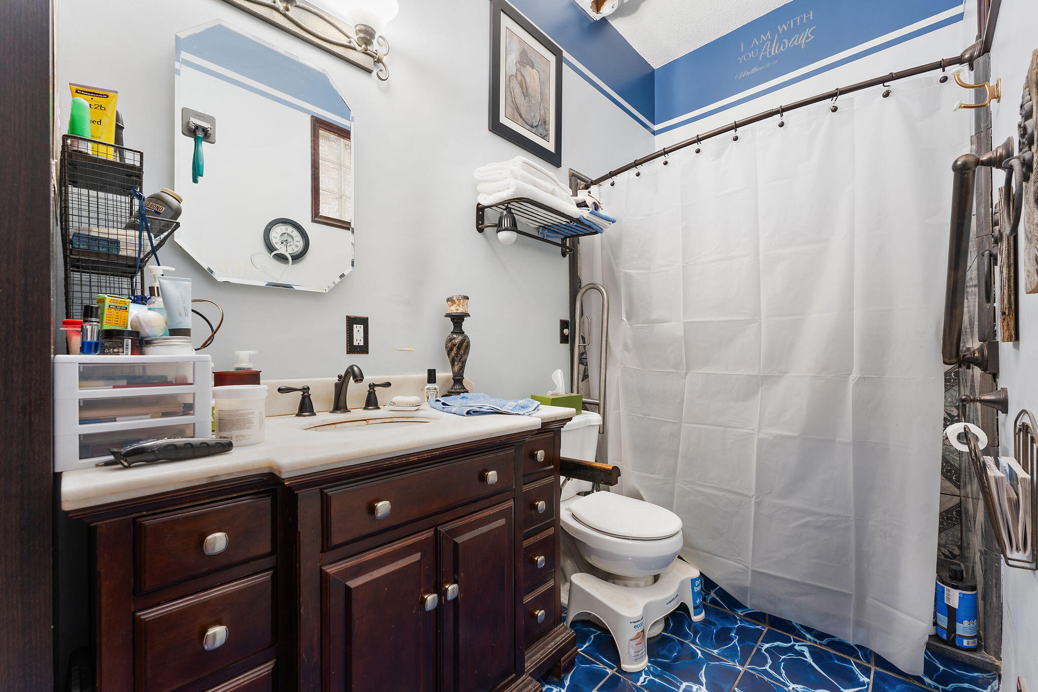 3115 West 800th Street North Rensselaer, IN 47978 - Photo 24 of 36 a bathroom with a sink a toilet and shower