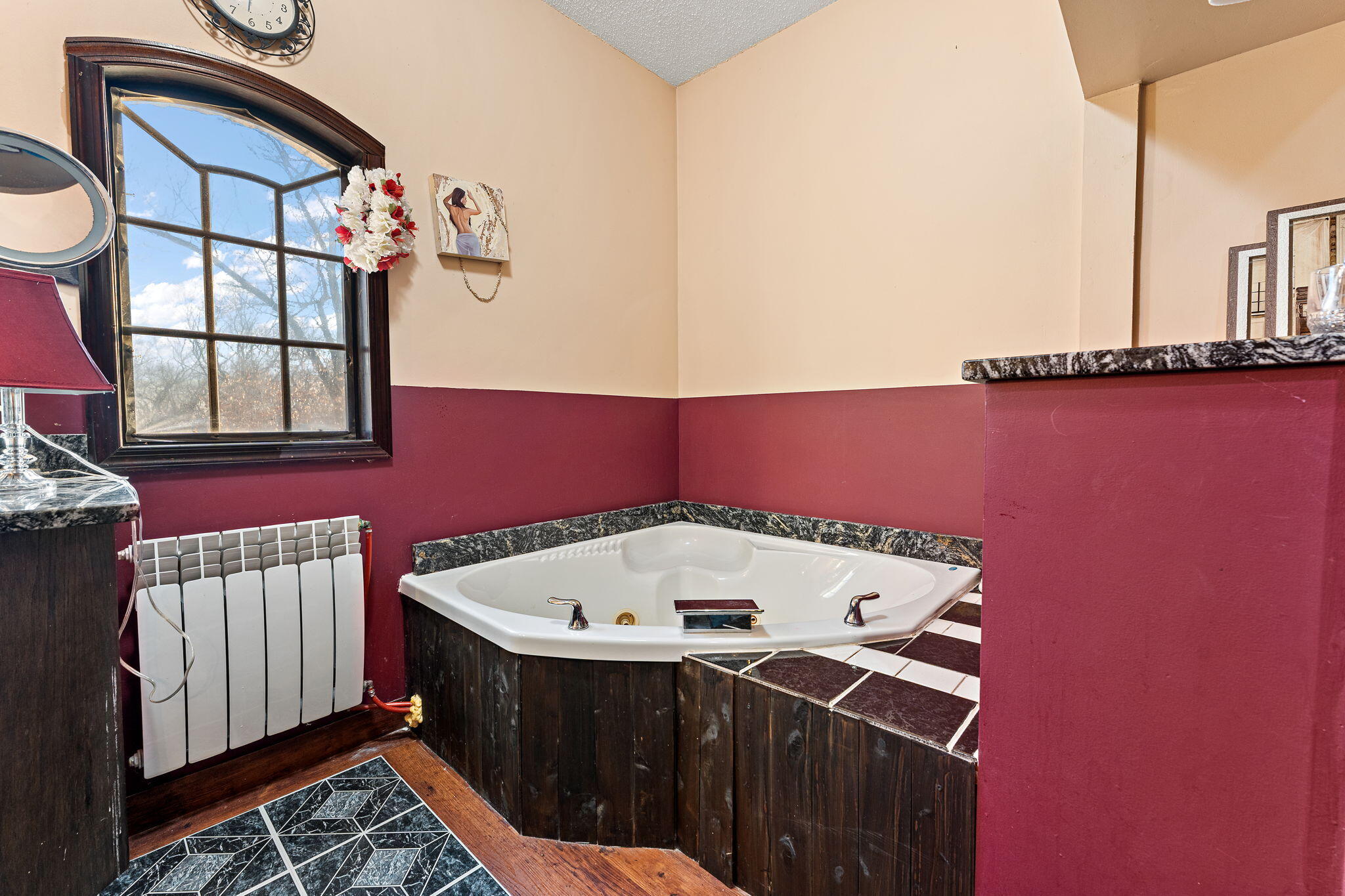 3115 West 800th Street North Rensselaer, IN 47978 - Photo 26 of 36 a bathroom with a sink a mirror and a window
