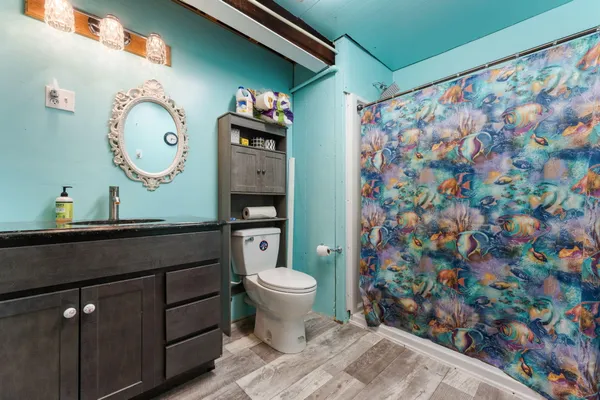a utility room with sink dryer and washer