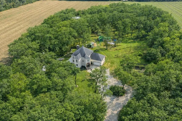 a view of a house in a yard