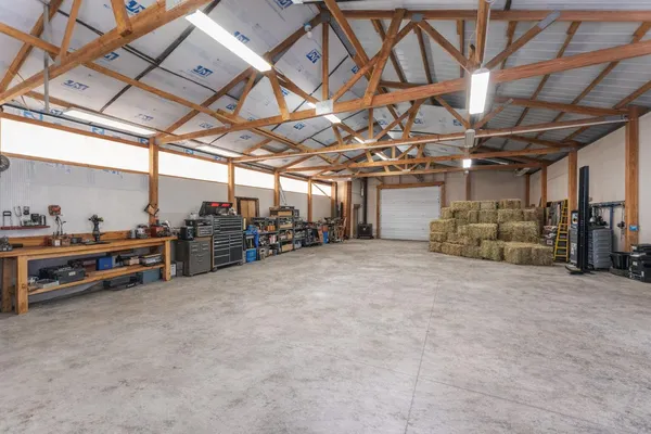 a aerial view of a house with a yard