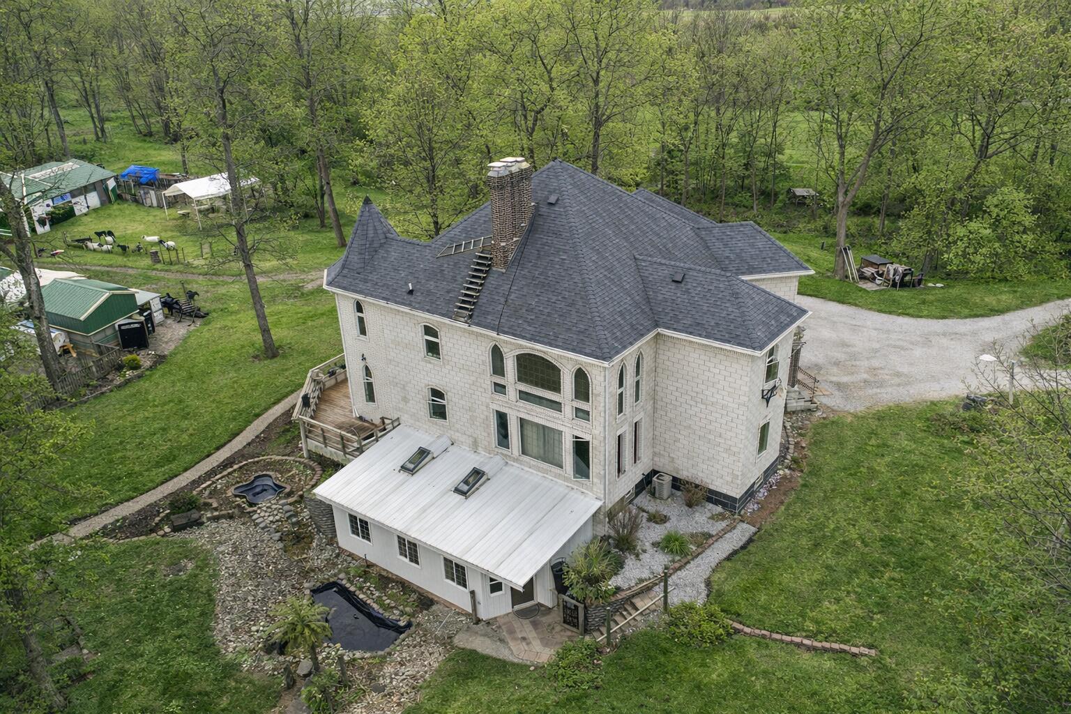 3115 West 800th Street North Rensselaer, IN 47978 - Photo 6 of 36 an aerial view of a house with a big yard