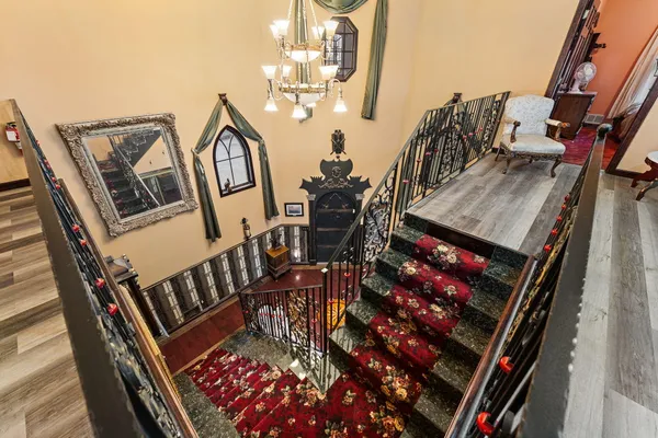a view of an chairs in the balcony