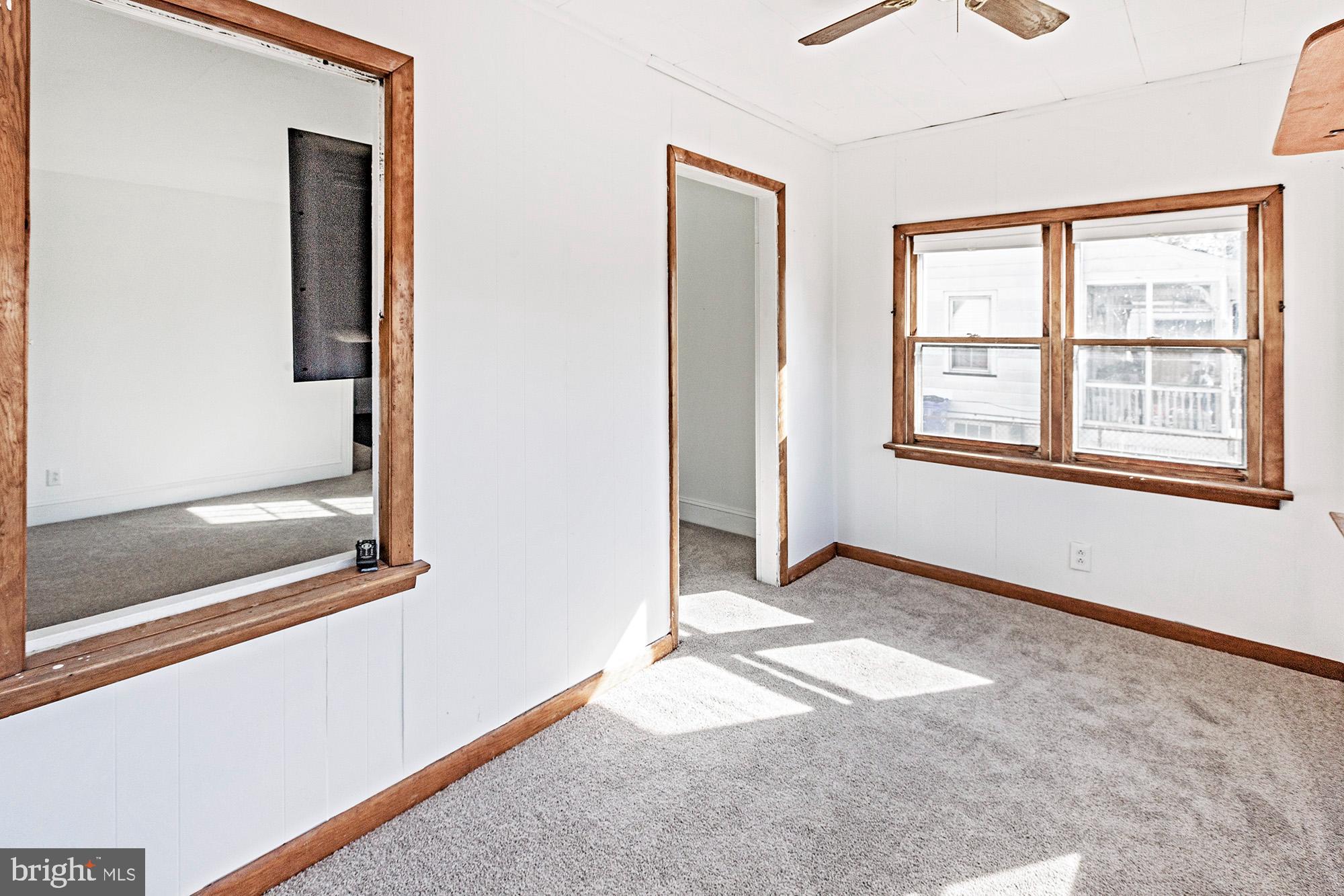 56 Main Street Hancocks Bridge, NJ 08038 - Photo 14 of 33 Bright and airy room with charming windows.