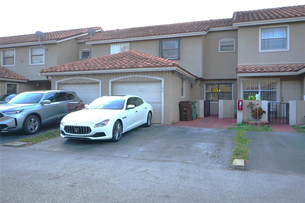 6380 West 24th Court Hialeah, FL 33016 - Photo 1 of 41 a car parked in front of a house