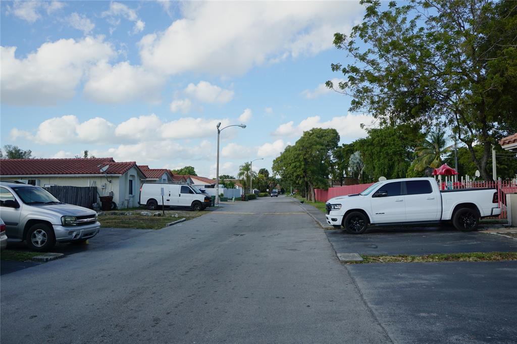 6380 West 24th Court Hialeah, FL 33016 - Photo 40 of 41 a view of street with parked cars