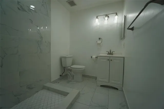 a bathroom with a toilet