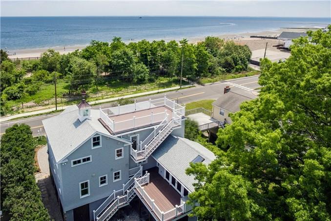 228 Fairfield Beach Road Fairfield, CT 06824 - Photo 1 of 1 an aerial view of a house with a yard