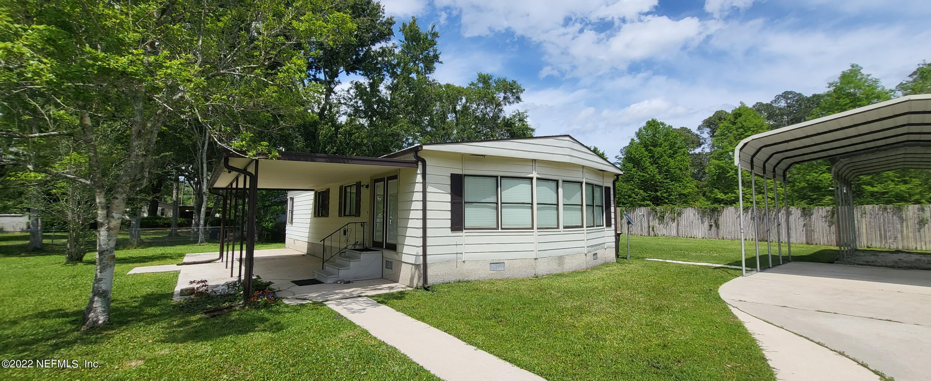7015 Charmayn Road Jacksonville, FL 32244 - Photo 3 of 51 Side