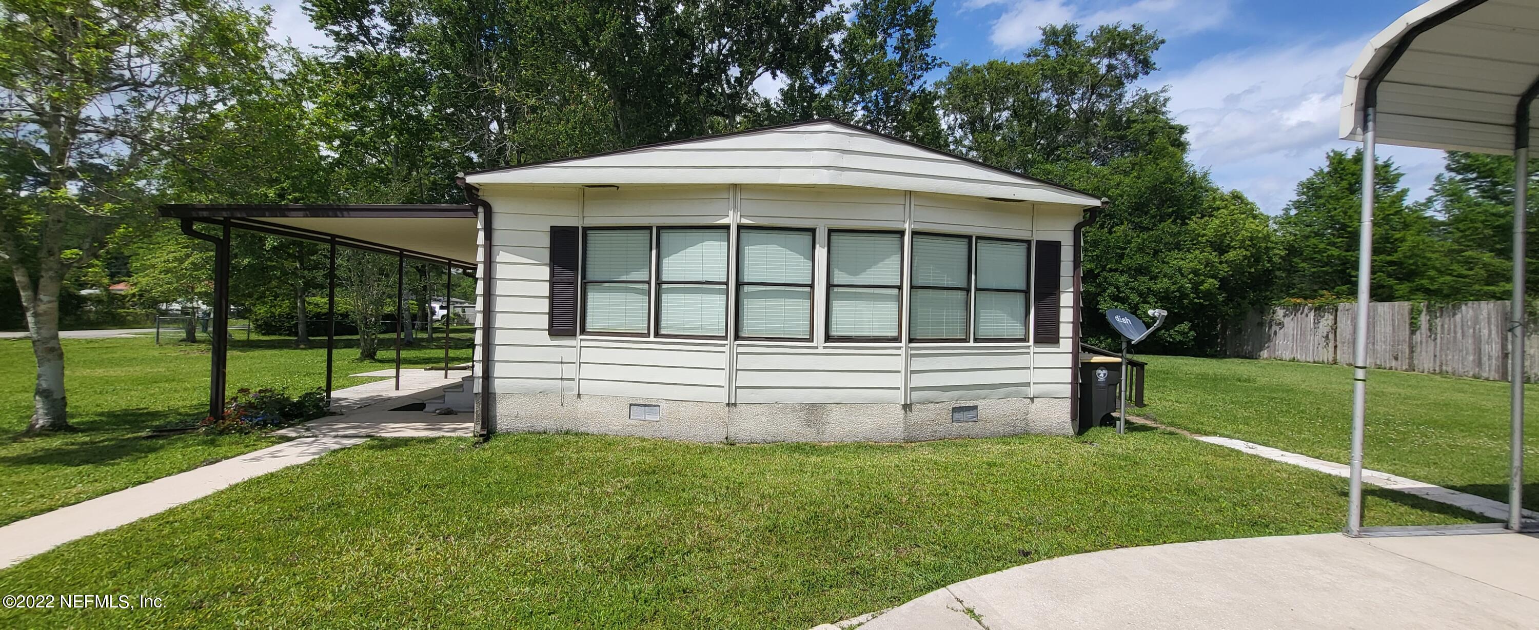 7015 Charmayn Road Jacksonville, FL 32244 - Photo 4 of 51 Side