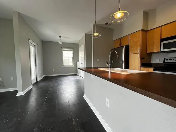 a lobby with furniture and a large window