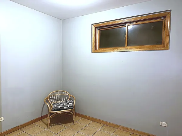 a view of staircase with wooden door