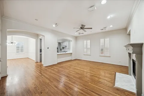 a view of livingroom with hardwood floor and a ceiling fan