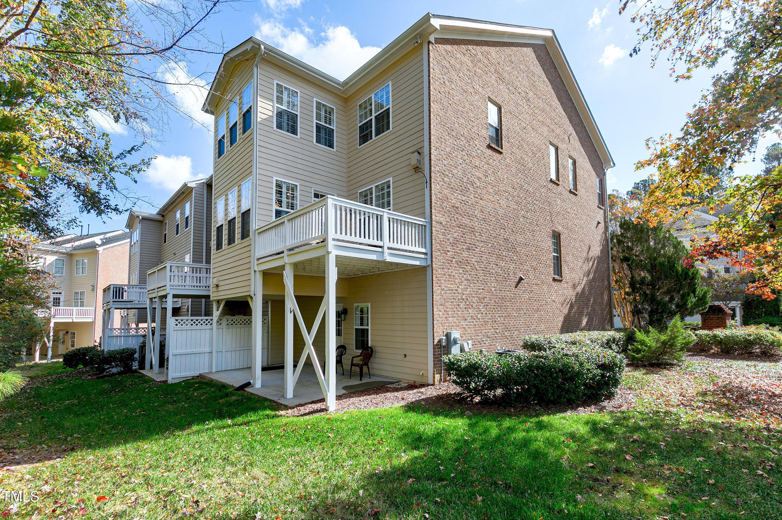 303 Bridgegate Drive Cary, NC 27519 - Photo 11 of 25 front view of a house with a yard
