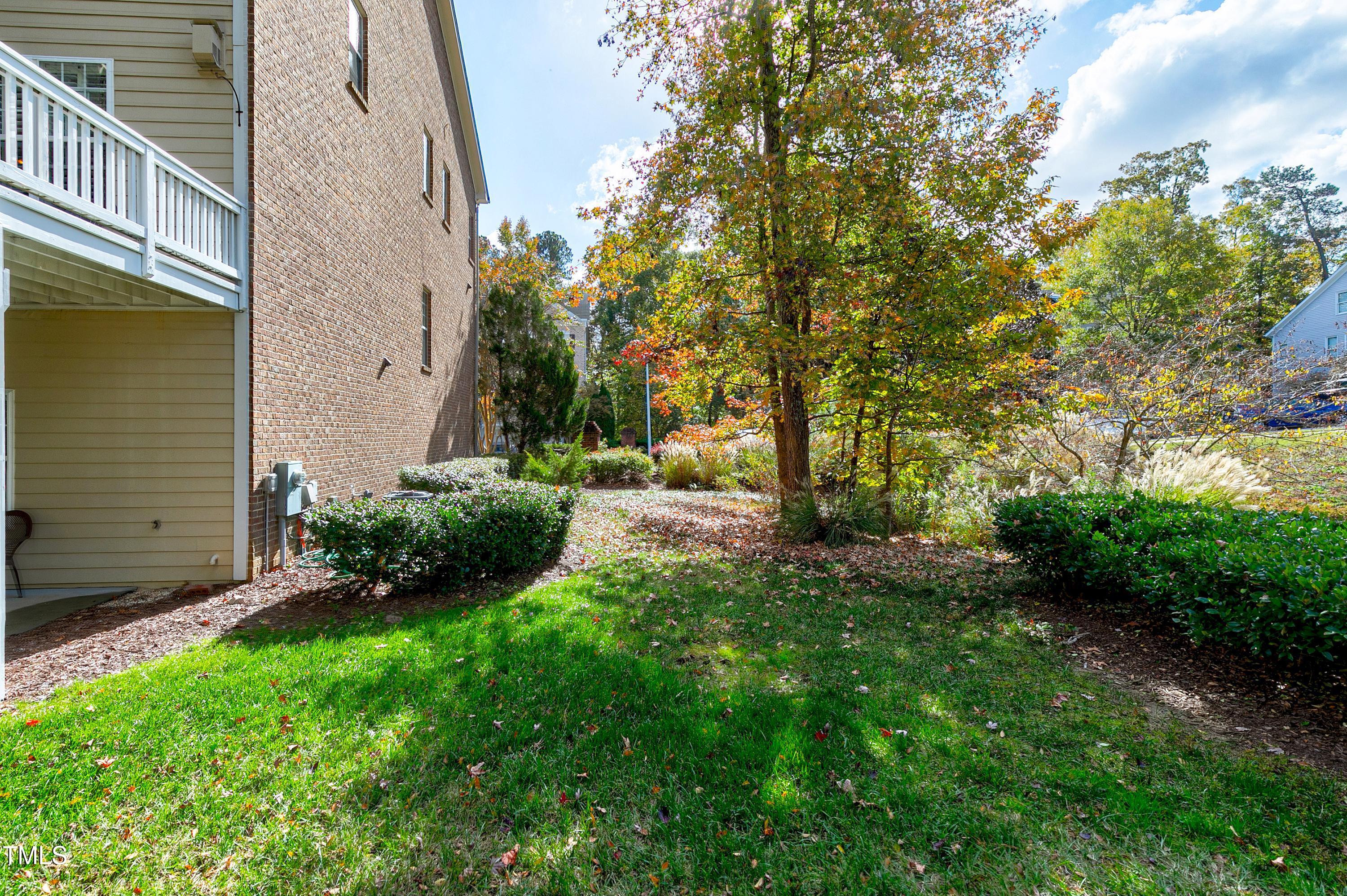 303 Bridgegate Drive Cary, NC 27519 - Photo 14 of 25 a view of backyard with patio