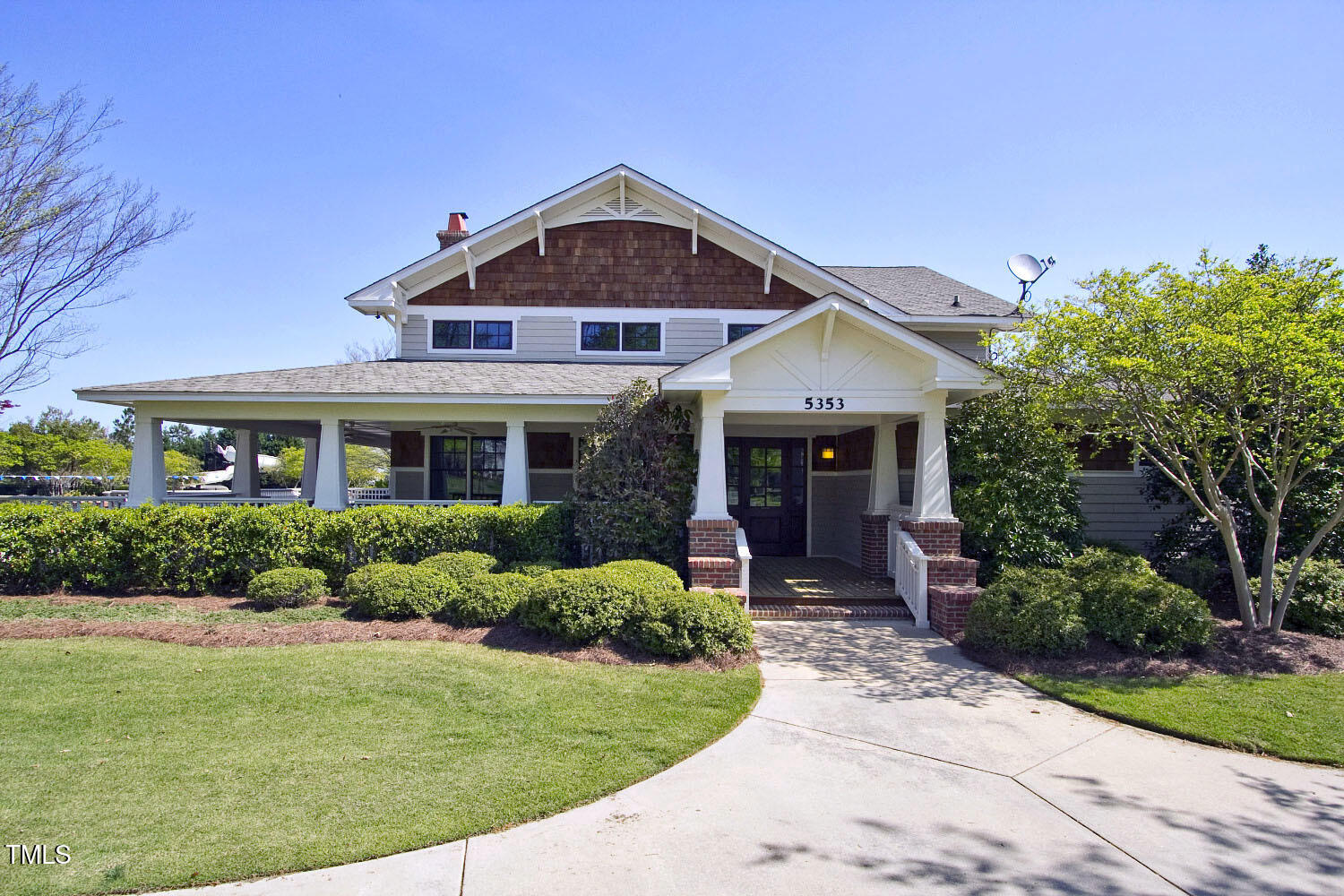303 Bridgegate Drive Cary, NC 27519 - Photo 22 of 25 a front view of a house with a yard
