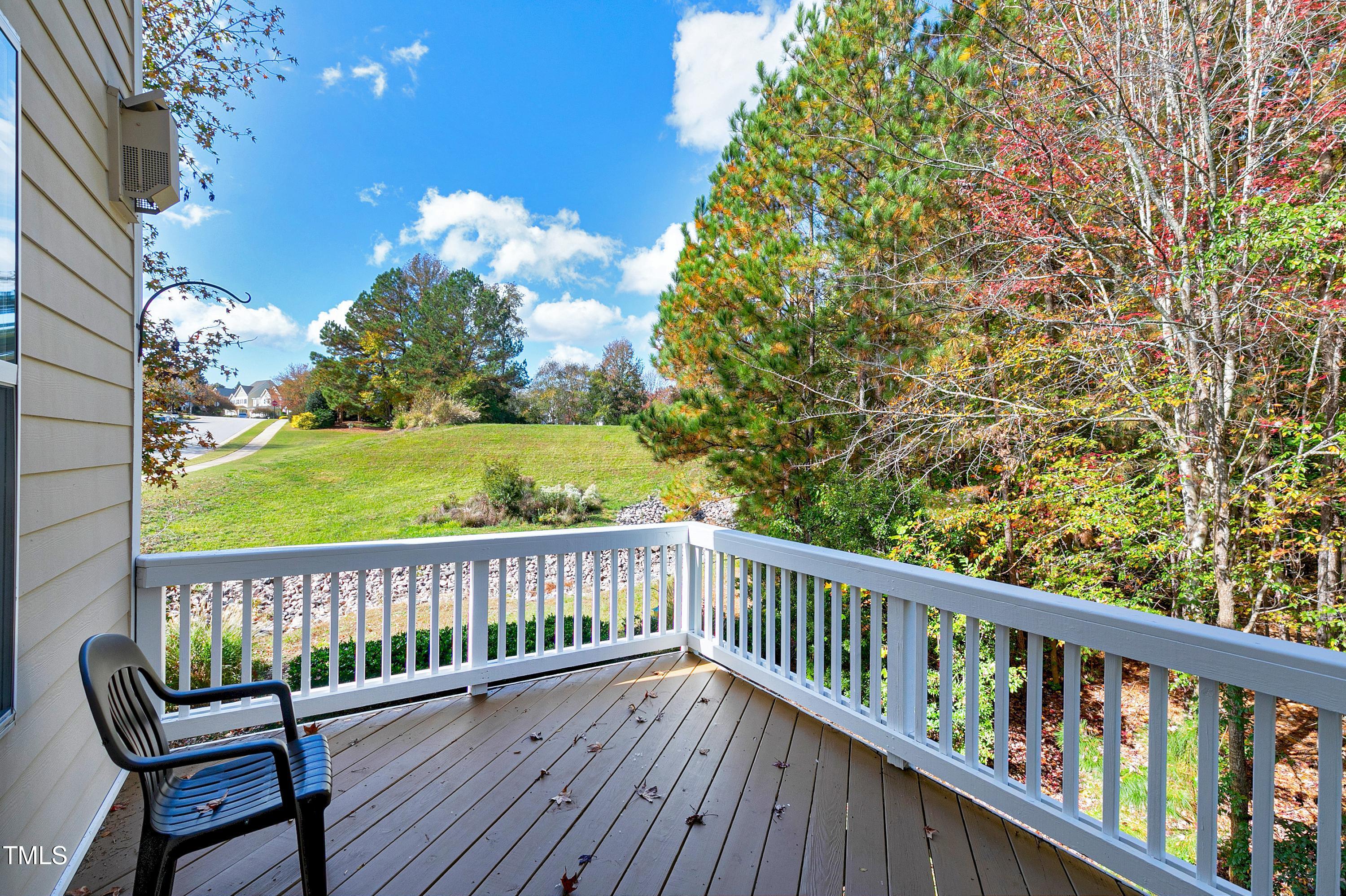 303 Bridgegate Drive Cary, NC 27519 - Photo 3 of 25 a view of a balcony with wooden floor