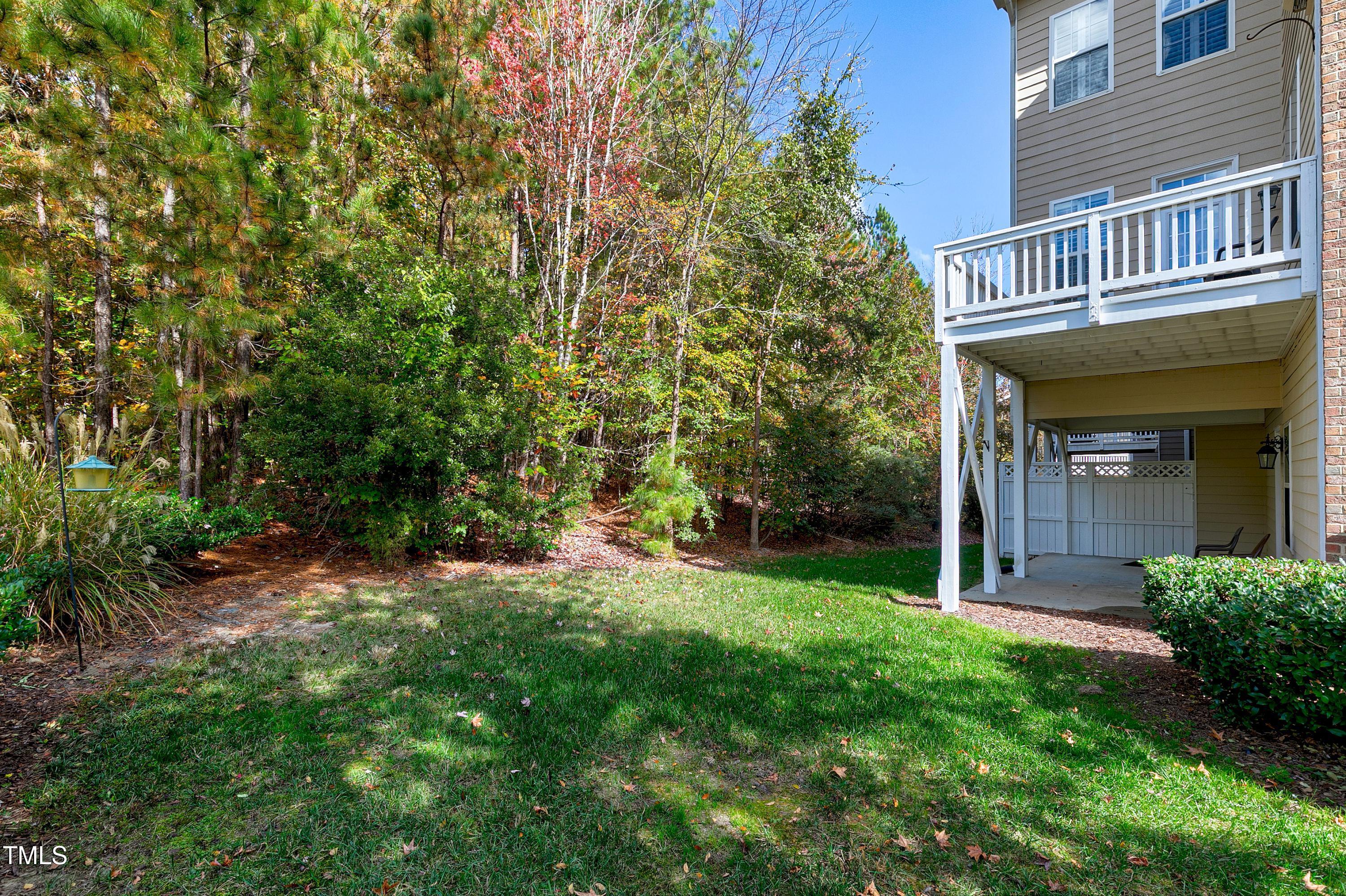 303 Bridgegate Drive Cary, NC 27519 - Photo 10 of 25 a view of a house with a yard and pathway