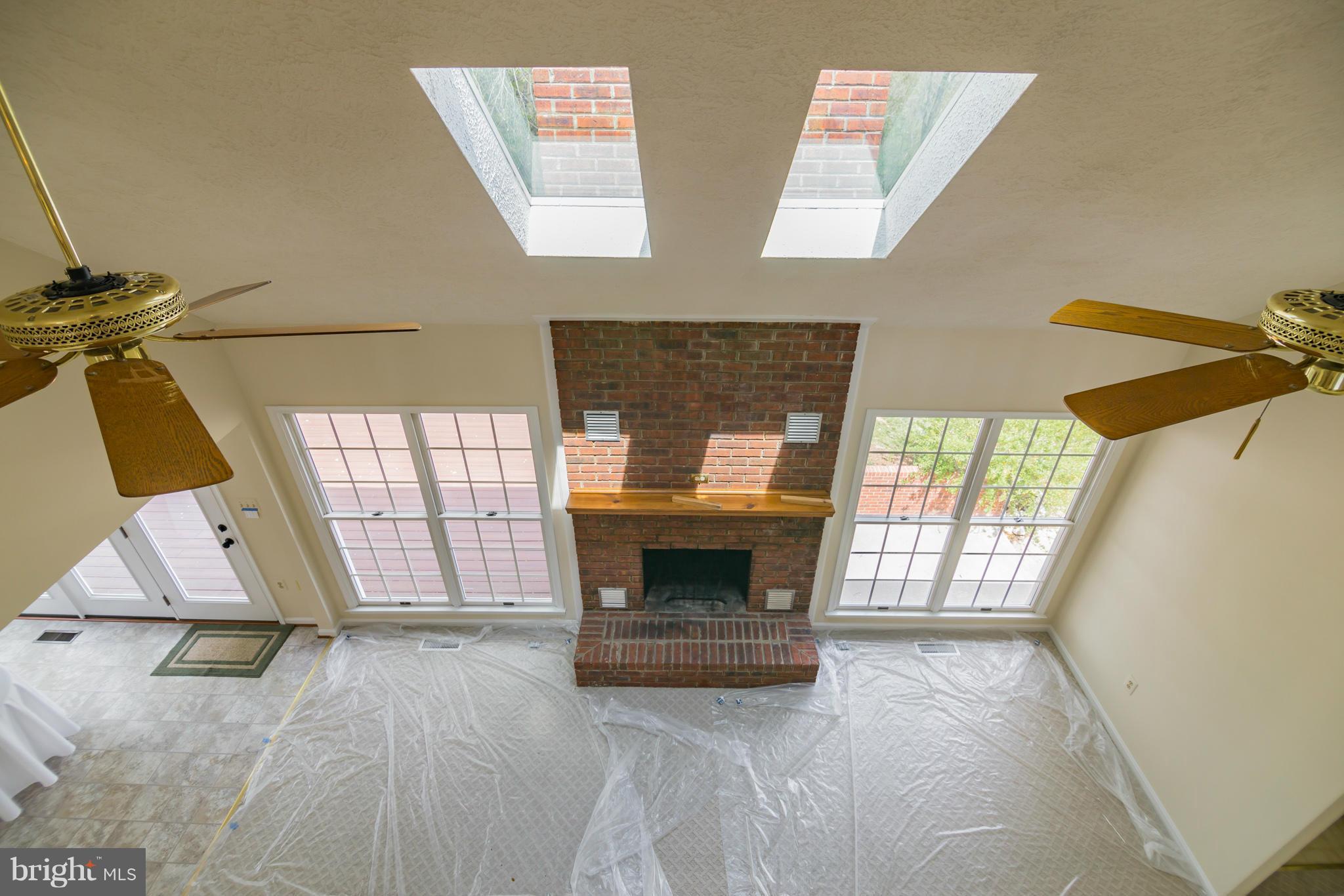 3055 Hickory Ridge Road Dunkirk, MD 20754 - Photo 2 of 29 a living room with furniture and a fireplace