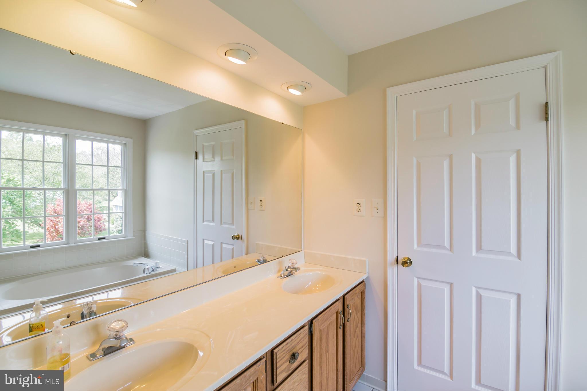 3055 Hickory Ridge Road Dunkirk, MD 20754 - Photo 15 of 29 a spacious bathroom with a shower and a sink