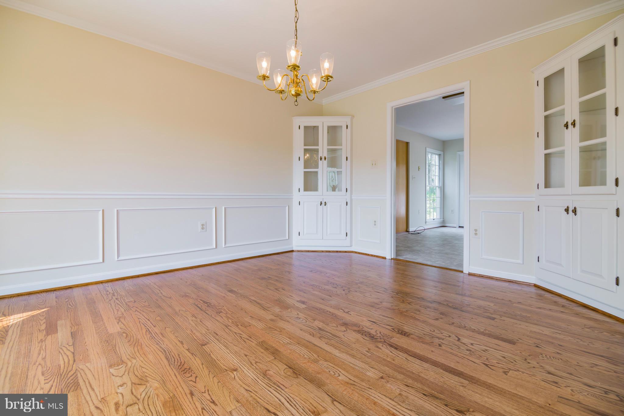 3055 Hickory Ridge Road Dunkirk, MD 20754 - Photo 9 of 29 wooden floor in an empty room with a window