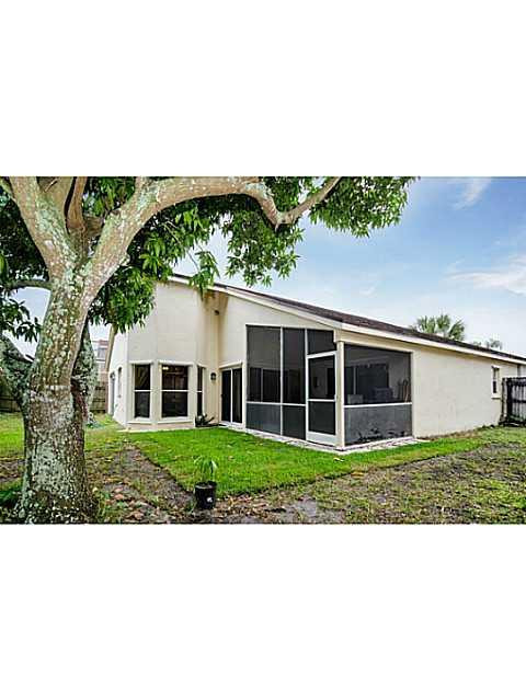 9406 Aegean Drive Boca Raton, FL 33496 - Photo 13 of 17 a black and white photo of a house