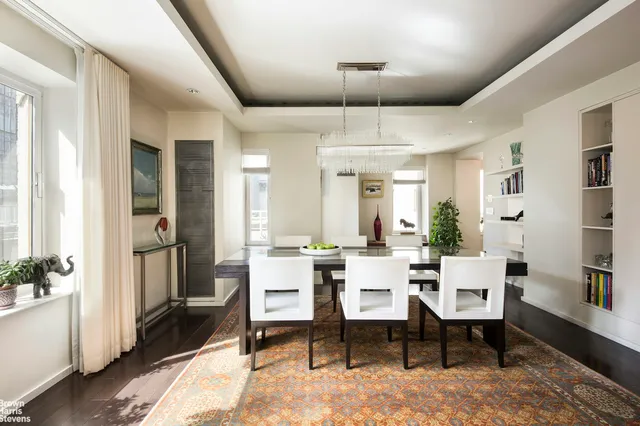 a view of a livingroom with furniture and window