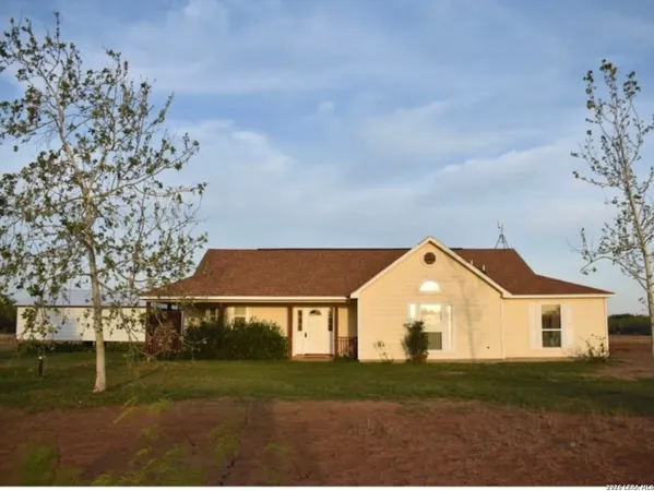 a view of house with outdoor space and street view