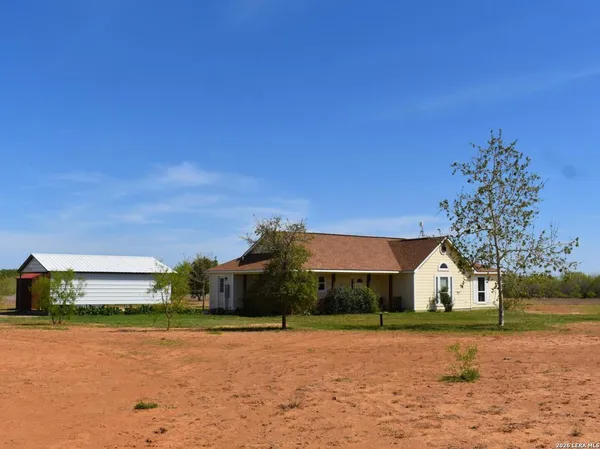 a front view of house with yard