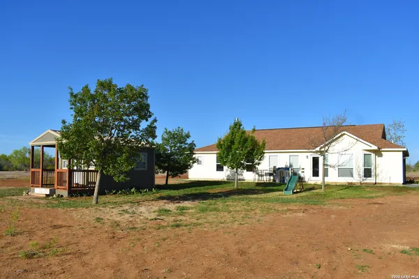 a view of house with outdoor space