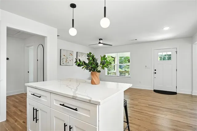a view of a center kitchen and living room