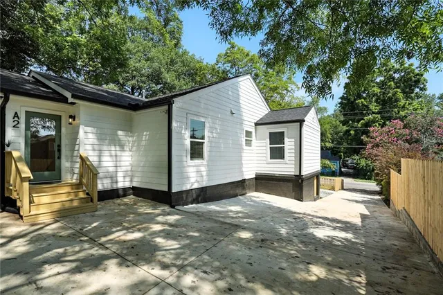 a front view of a house with a porch