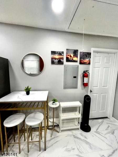 6 Charles Street, Unit 2 Montclair, NJ 07042 - Photo 7 of 13 a workspace with furniture and window
