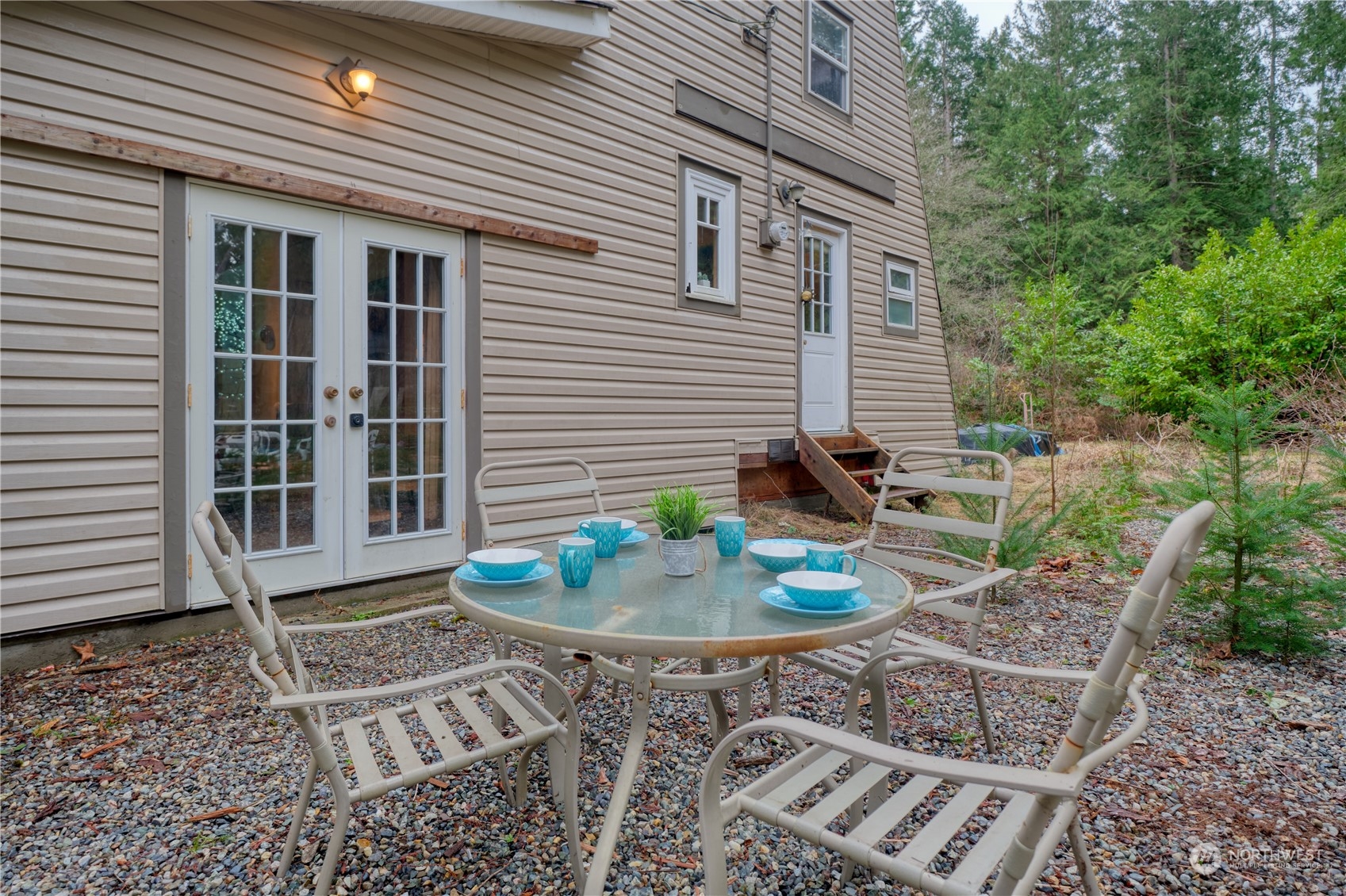 1979 Wellington Road Point Roberts, WA 98281 - Photo 3 of 23 a backyard of a house with outdoor seating