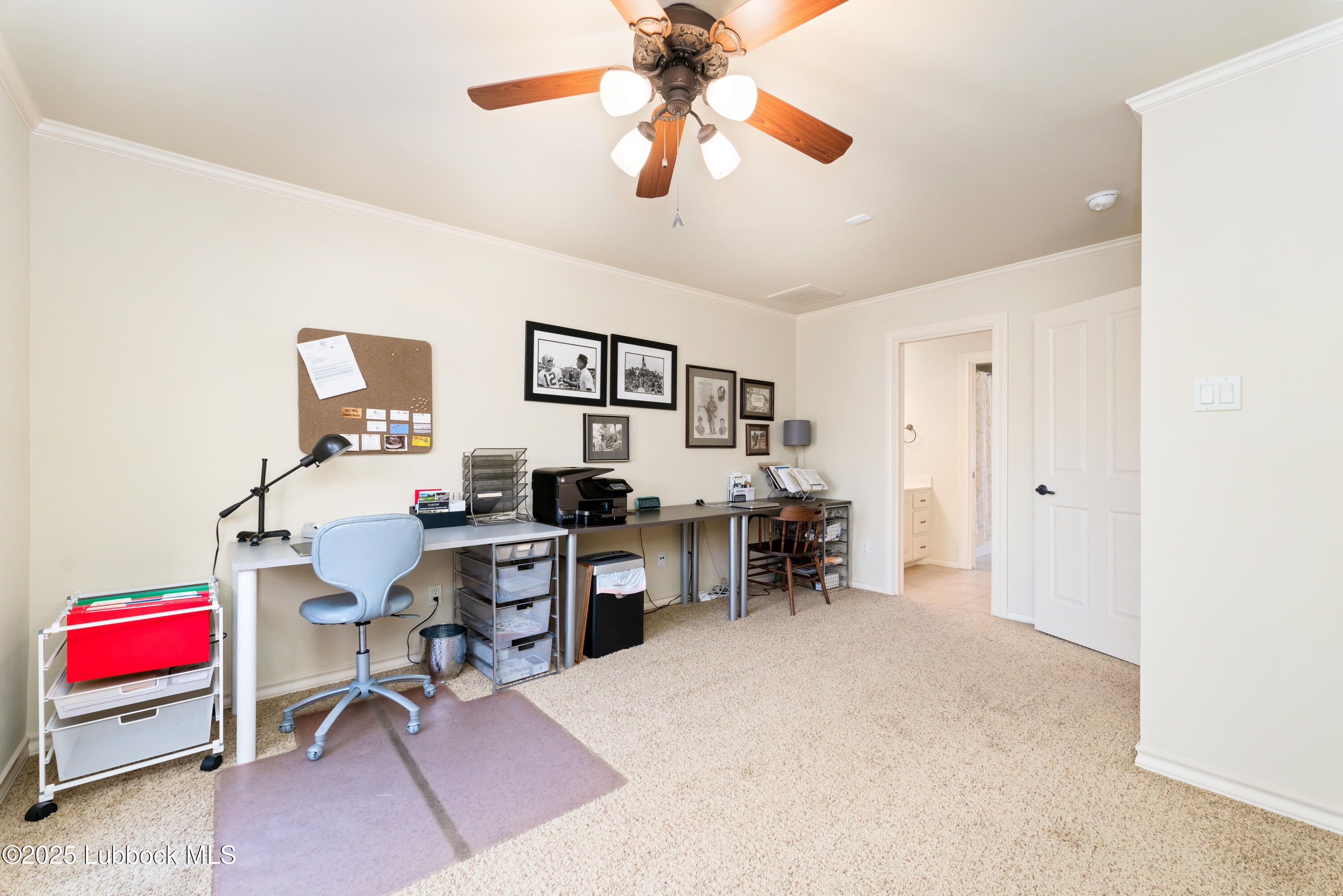 4501 19th Street, Unit 7 Lubbock, TX 79407 - Photo 18 of 30 a view of a workspace with furniture