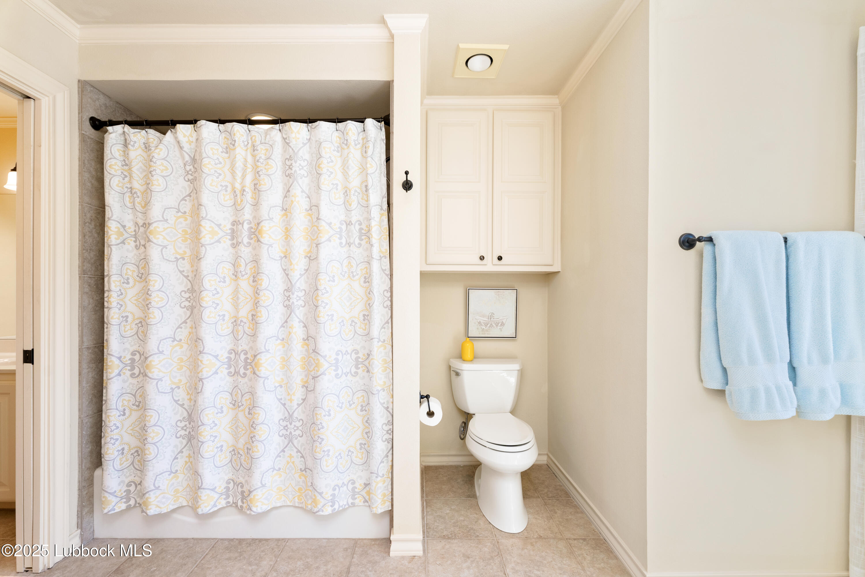 4501 19th Street, Unit 7 Lubbock, TX 79407 - Photo 22 of 30 a bathroom with a toilet sink and shower