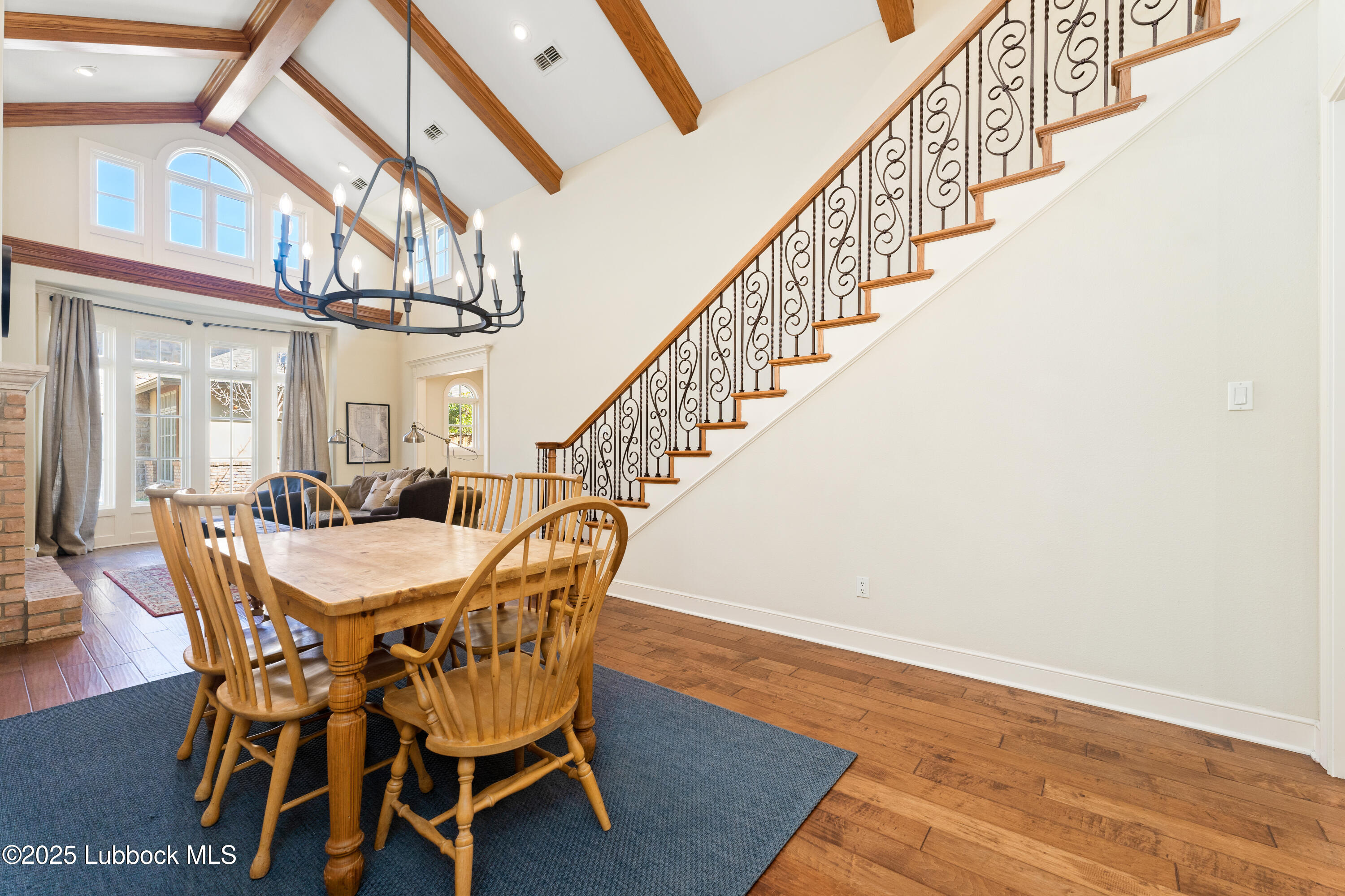 4501 19th Street, Unit 7 Lubbock, TX 79407 - Photo 8 of 30 a view of a dining room with furniture and wooden floor