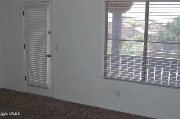 a view of a room that has a window