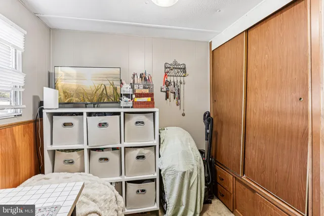 a workspace with furniture and window