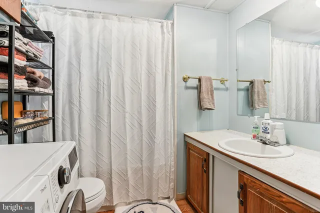 a view of front a house with a yard