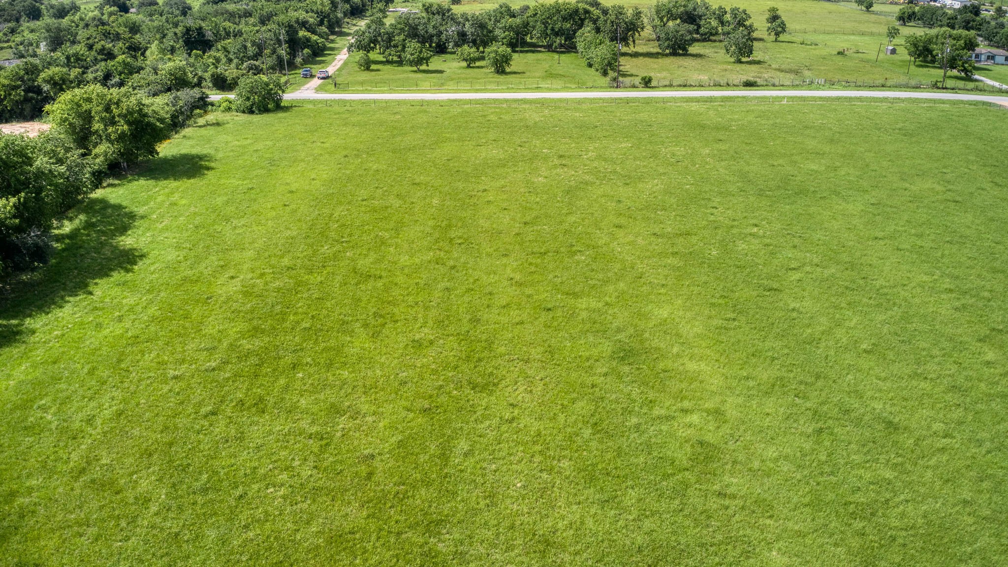 32626 Knebel Road Waller, TX 77484 - Photo 11 of 21 a view of a green field with lots of trees