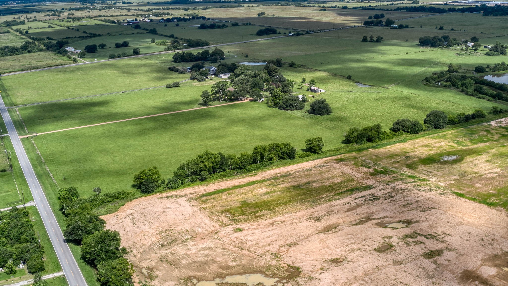 32626 Knebel Road Waller, TX 77484 - Photo 12 of 21 a view of a water pond with green yard